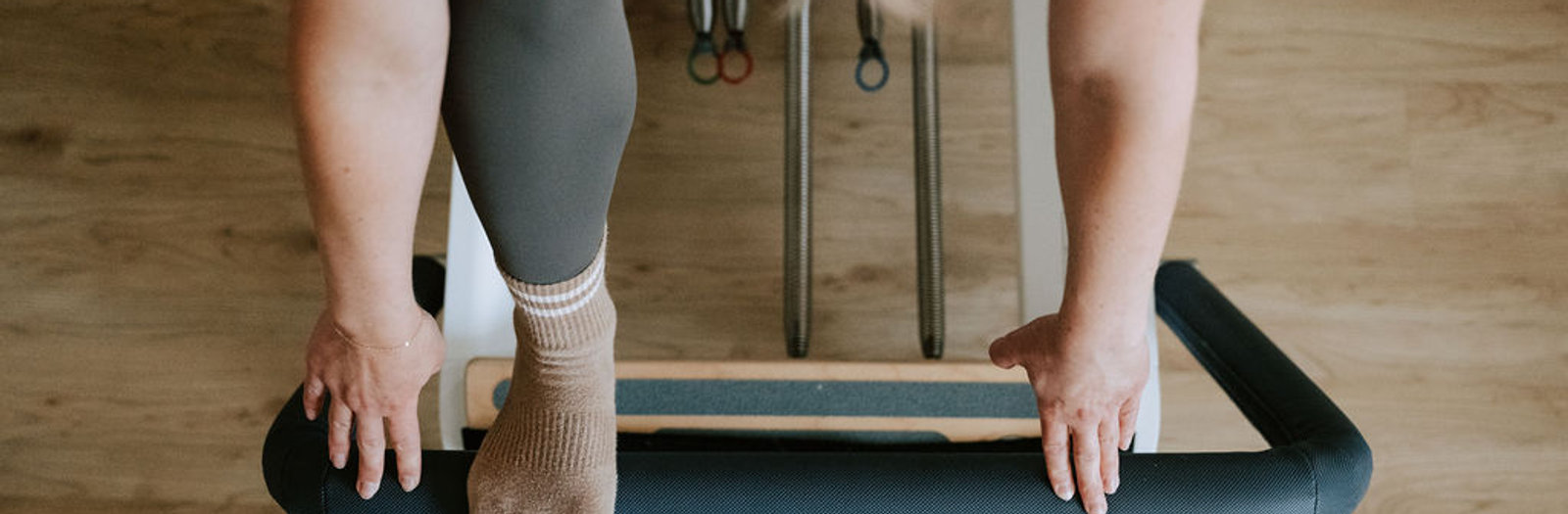 Students in a reformer Pilates class
