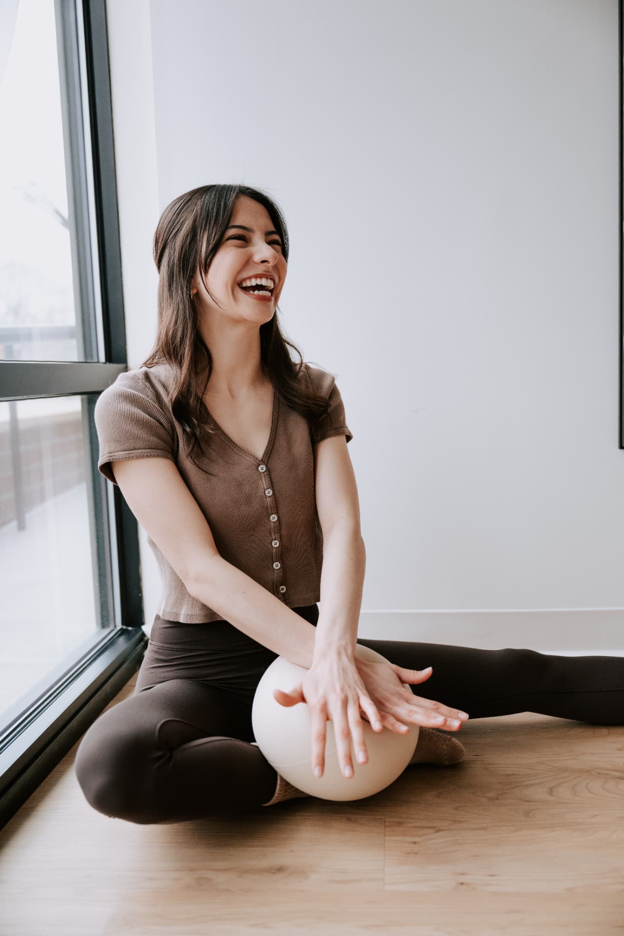 Kira, instructor, front desk at Core Collective Pilates in Ann Arbor
