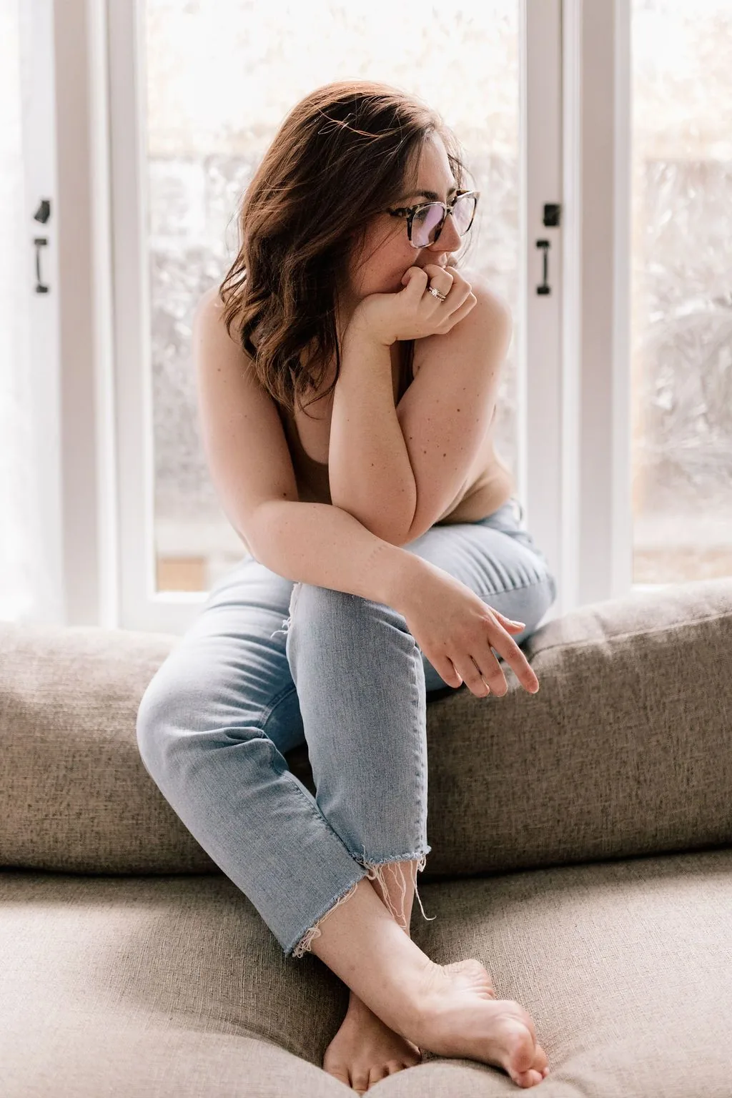 Kelly Ridenour seated by a bright window