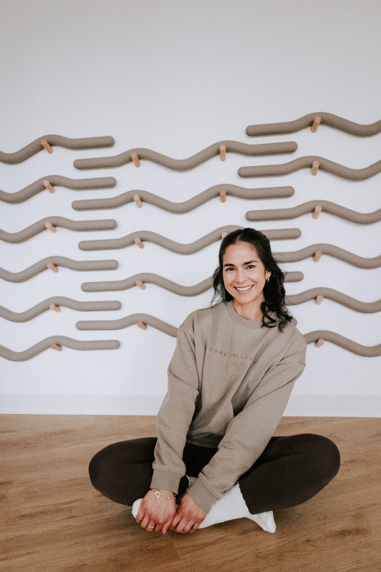 Luci, instructor at Core Collective Pilates in Ann Arbor
