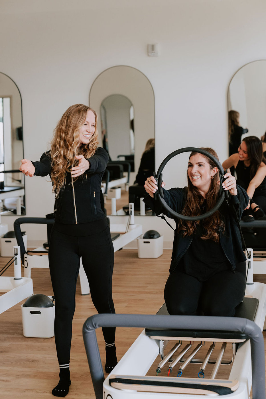 Instructor teaching Pilates fundamentals at the Funda-mentals Workshop