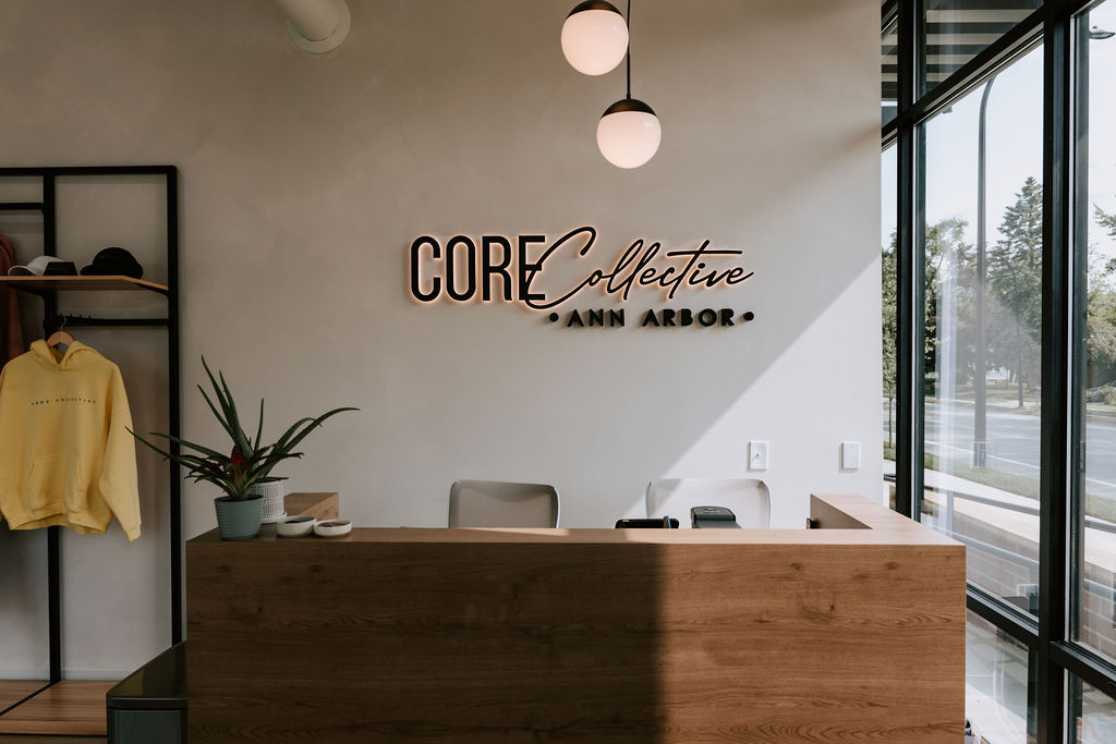 Core Collective Packard Row reception desk and logo wall