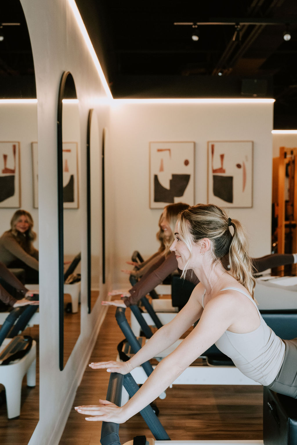Clients in a Reformer class at the Core Collective Plymouth Road studio